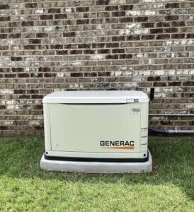 generac generator positioned outside of a residential daphne home
